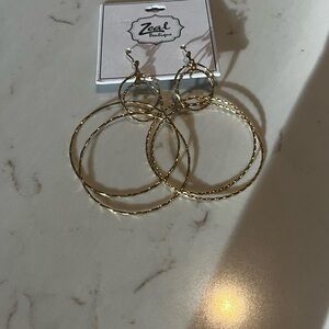 Zeal Boutique Twisted Gold Hoop Earrings